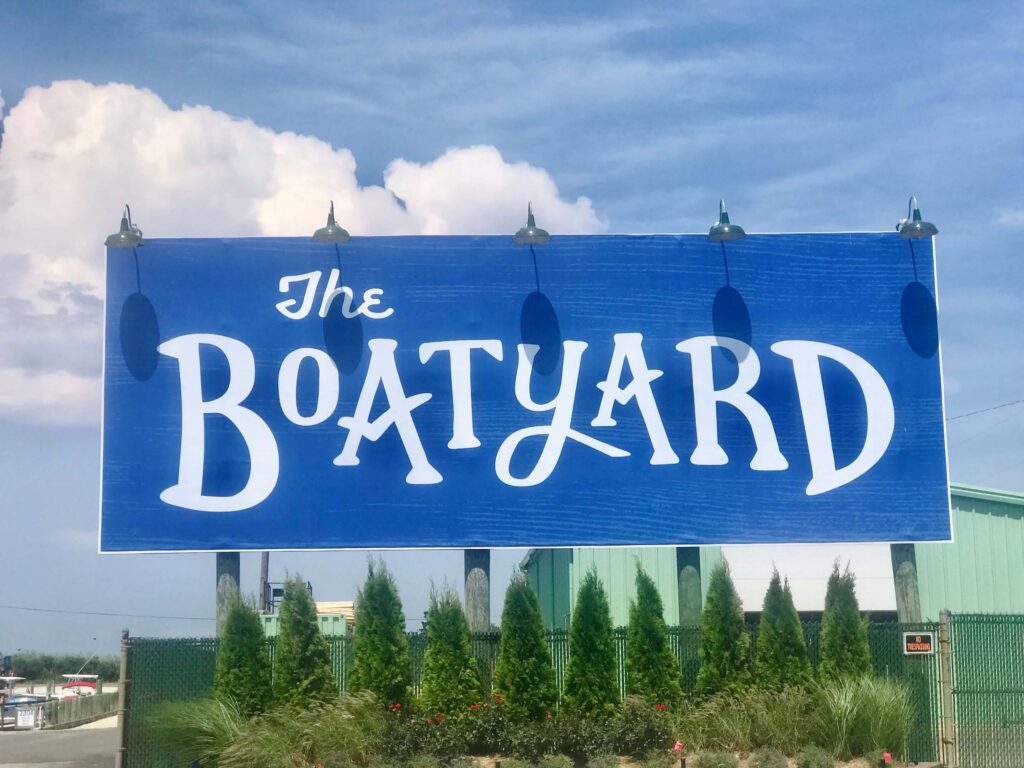 The Boatyard blue sign